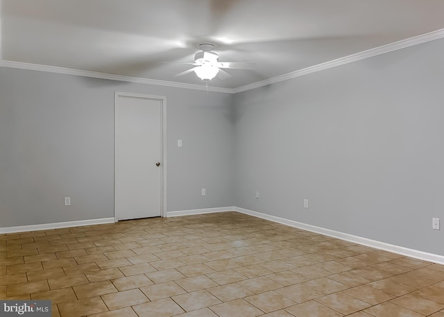 spare room with ceiling fan and crown molding