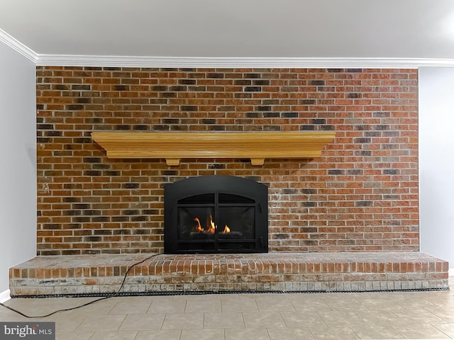 room details featuring a brick fireplace and ornamental molding