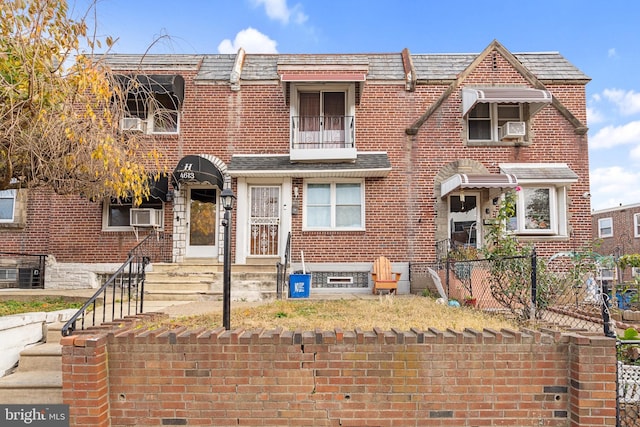 multi unit property featuring a balcony and cooling unit