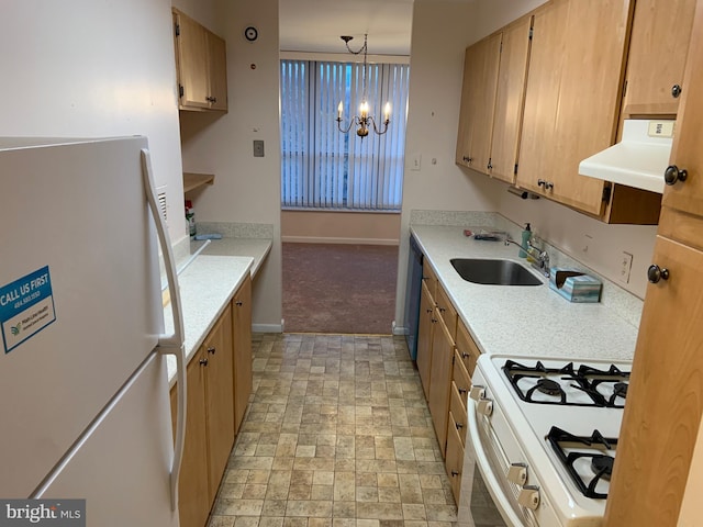 kitchen featuring white appliances, ventilation hood, sink, hanging light fixtures, and a notable chandelier