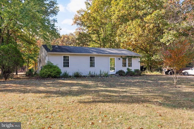 ranch-style house with a front yard