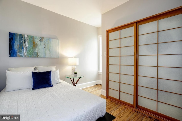 bedroom featuring light hardwood / wood-style floors