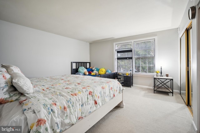 carpeted bedroom with a closet