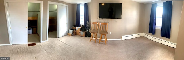 living room with baseboard heating