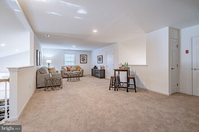 living room with light colored carpet