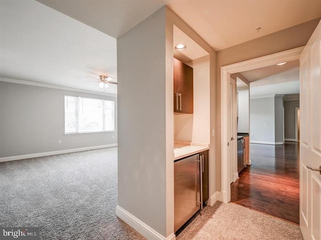 801 Key Hwy Unit 323, Baltimore, MD 21230 - hall with dark carpet, baseboards, ornamental molding, and recessed lighting