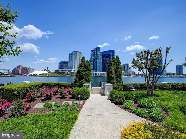 surrounding community featuring a water view