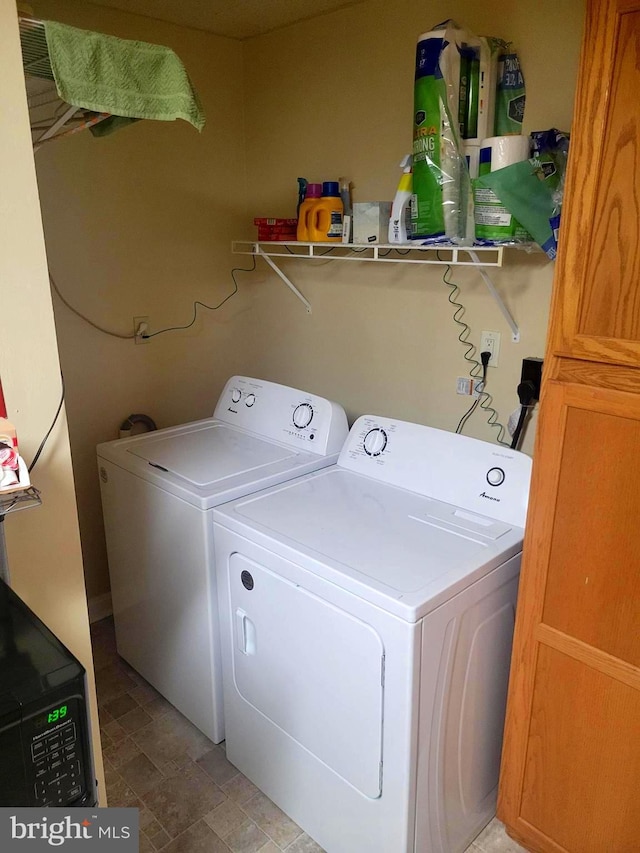 laundry room featuring washer and dryer