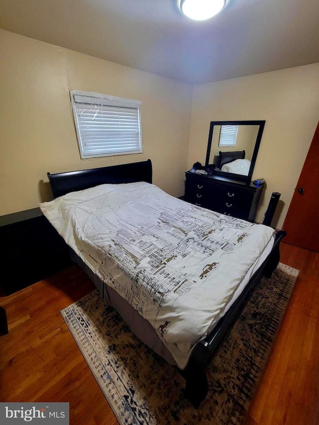 bedroom featuring hardwood / wood-style floors