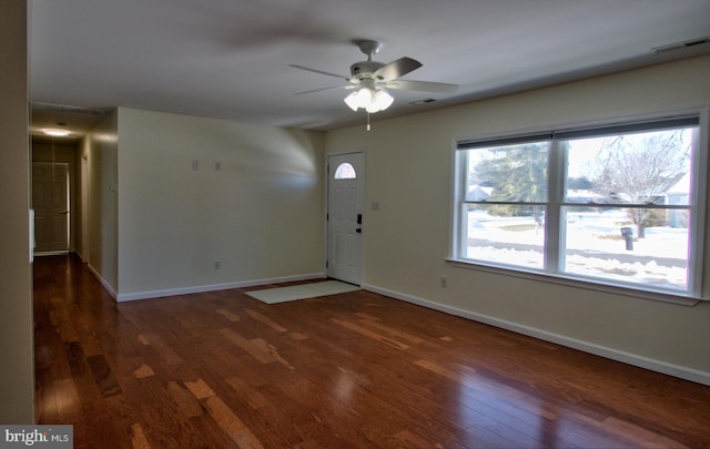 entryway featuring ceiling fan and dark hardwood / wood-style floors