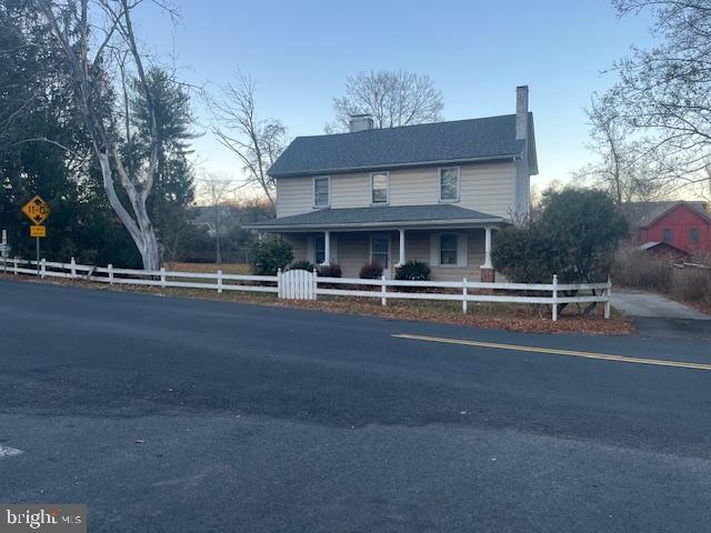 view of farmhouse-style home