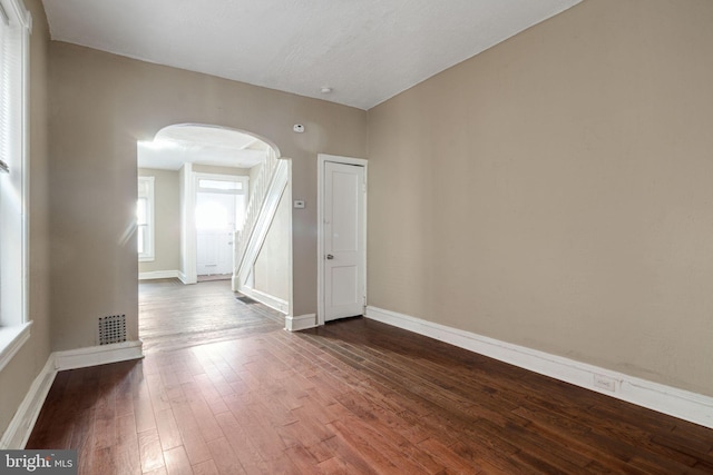 spare room with wood-type flooring