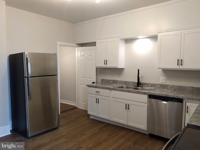 kitchen with white cabinets, stainless steel appliances, and sink