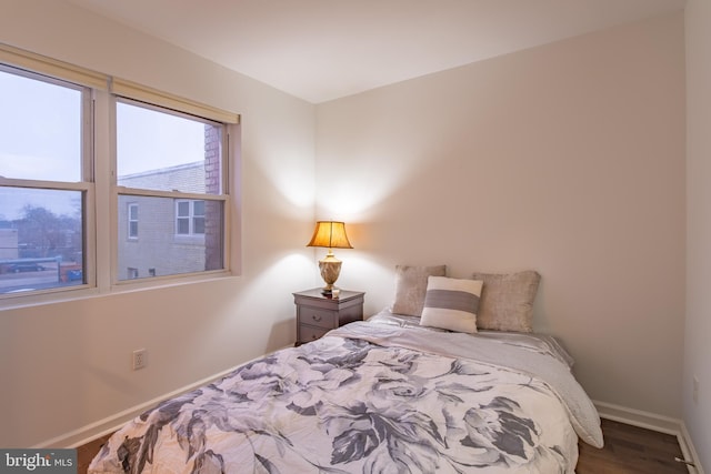 bedroom featuring wood-type flooring