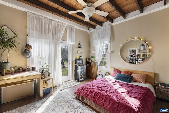 bedroom with beam ceiling, wood ceiling, and hardwood / wood-style flooring