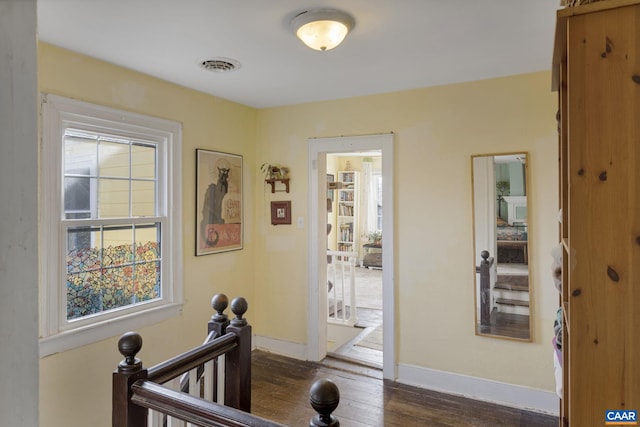 interior space with dark wood-type flooring