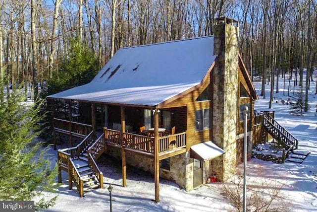 exterior space featuring a wooden deck