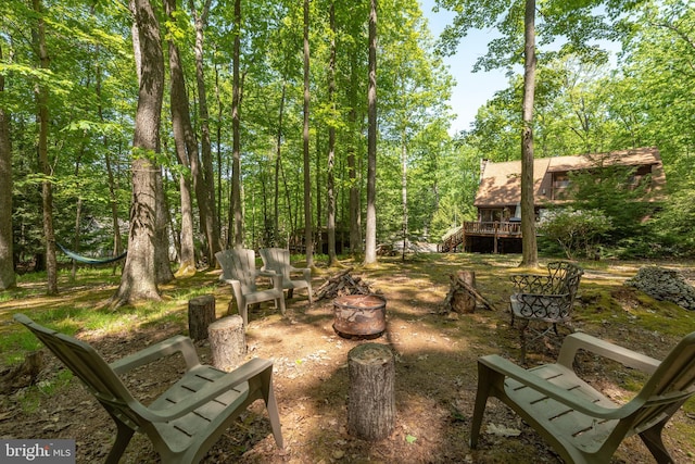 view of yard with a wooden deck