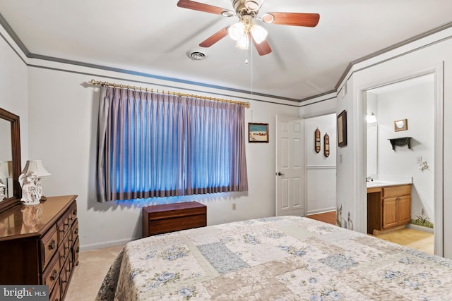 bedroom with ensuite bath, light colored carpet, ceiling fan, crown molding, and sink