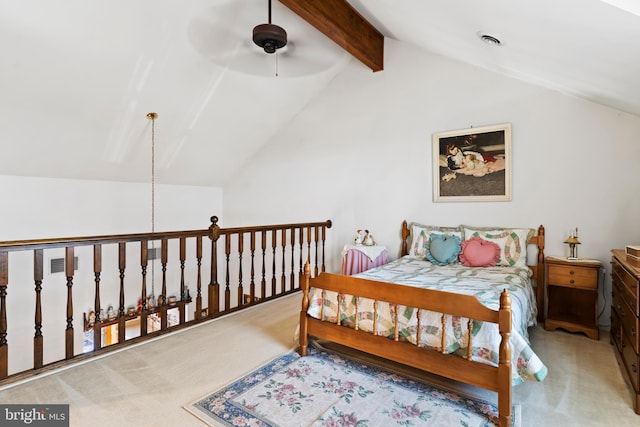 carpeted bedroom with vaulted ceiling with beams and ceiling fan