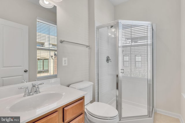 bathroom with walk in shower, tile patterned floors, and a wealth of natural light