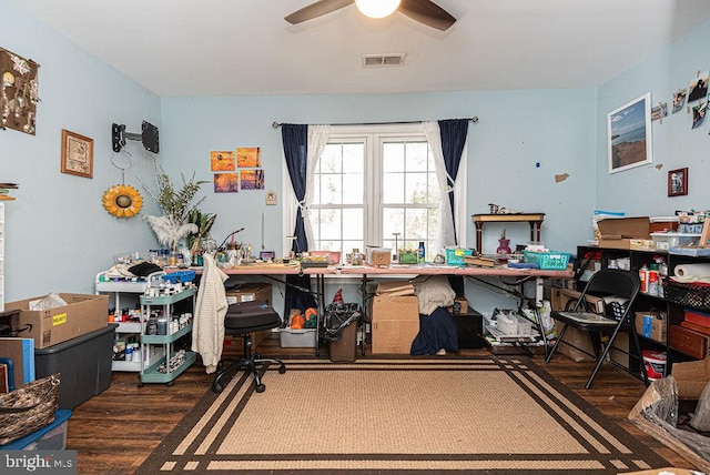 office area featuring ceiling fan and dark wood-type flooring