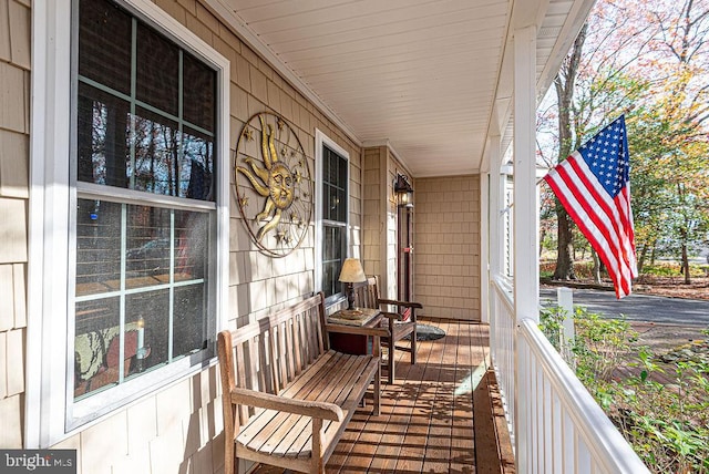 wooden deck featuring a porch