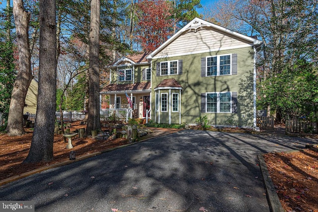 front facade with a porch