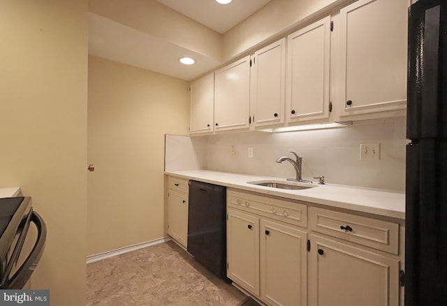 kitchen with white cabinetry, sink, and black appliances