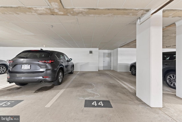 garage featuring a carport