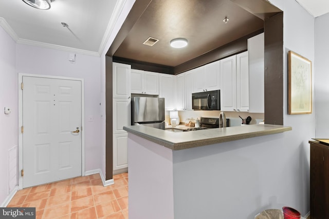 kitchen featuring light tile patterned flooring, black appliances, white cabinets, kitchen peninsula, and crown molding