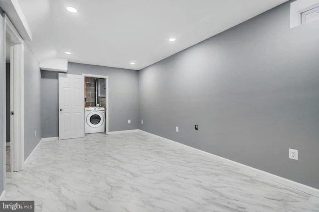 2396 Elvans Rd SE, Washington, DC 20020 - below grade area featuring washer / clothes dryer, recessed lighting, baseboards, and marble look tile flooring