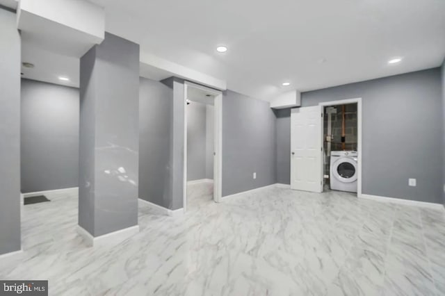 2396 Elvans Rd SE, Washington, DC 20020 - finished below grade area featuring washer / clothes dryer, recessed lighting, marble finish flooring, and baseboards