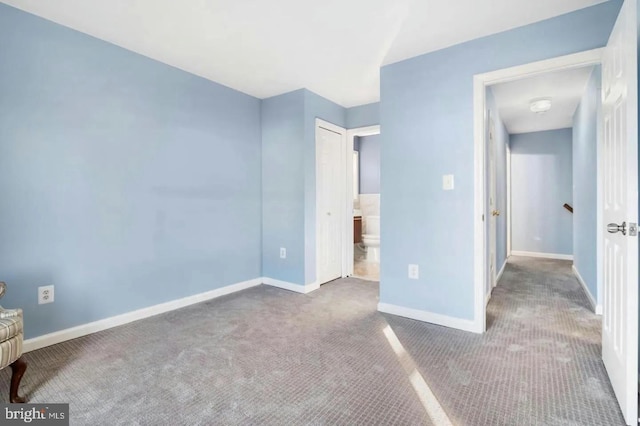 unfurnished bedroom featuring carpet floors