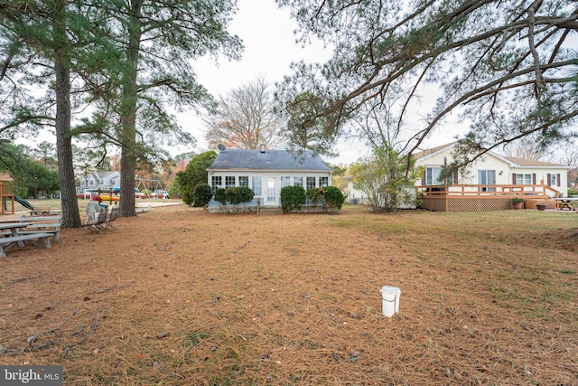 view of yard with a deck