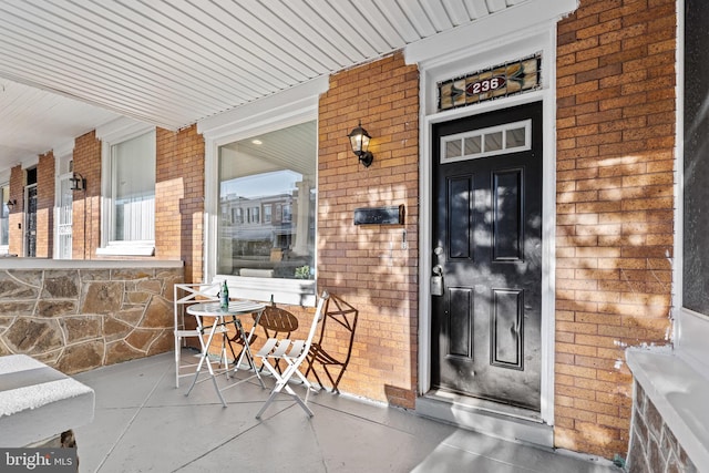 entrance to property with covered porch