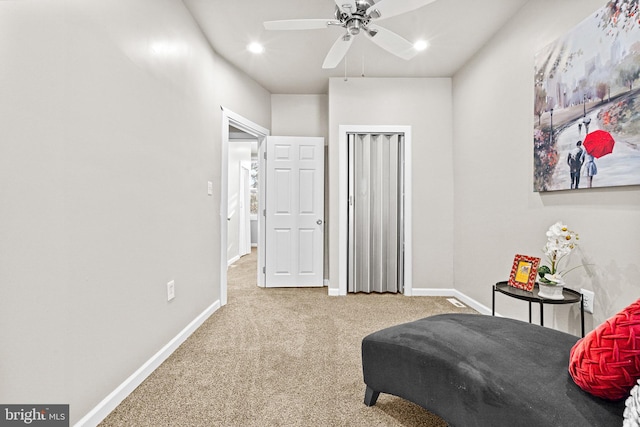 carpeted bedroom with ceiling fan