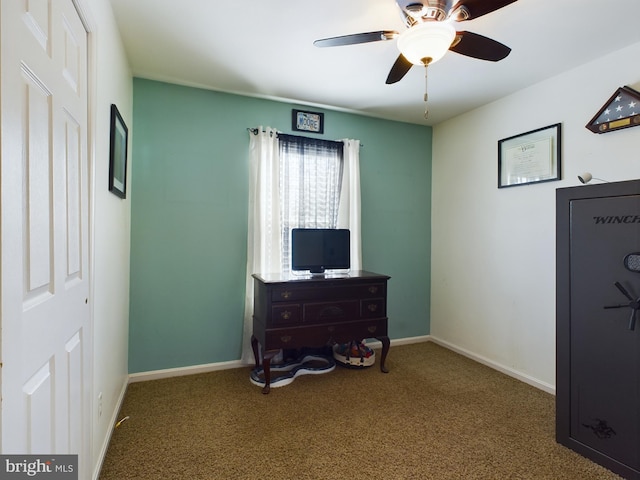 misc room featuring carpet flooring and ceiling fan