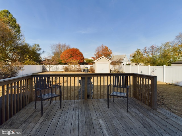 deck featuring a storage shed