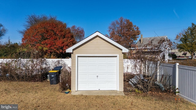 garage featuring a yard