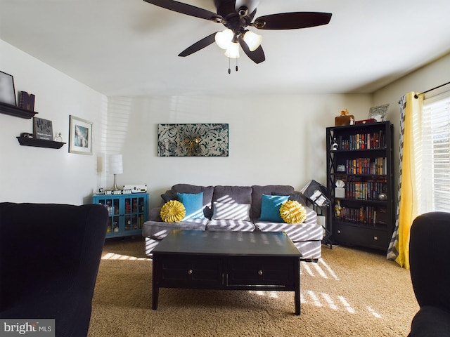 living room with carpet flooring and ceiling fan