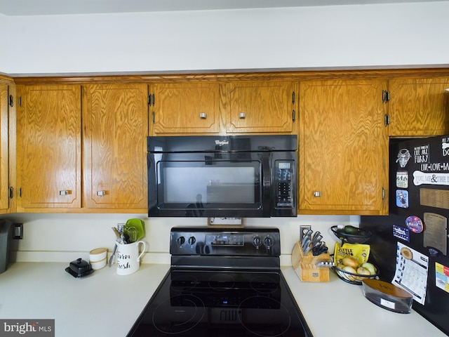 kitchen with black appliances