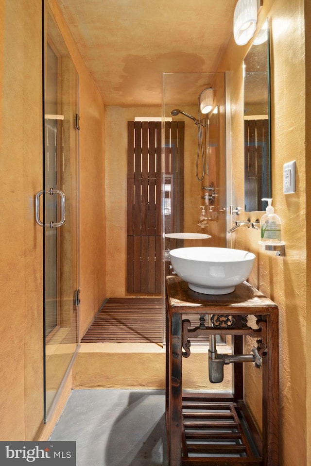 bathroom with a shower and sink