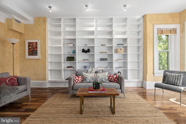 living room featuring dark wood-type flooring