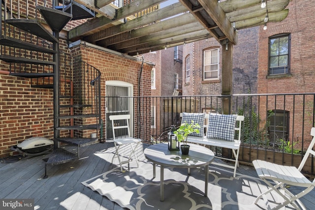 wooden deck with a pergola