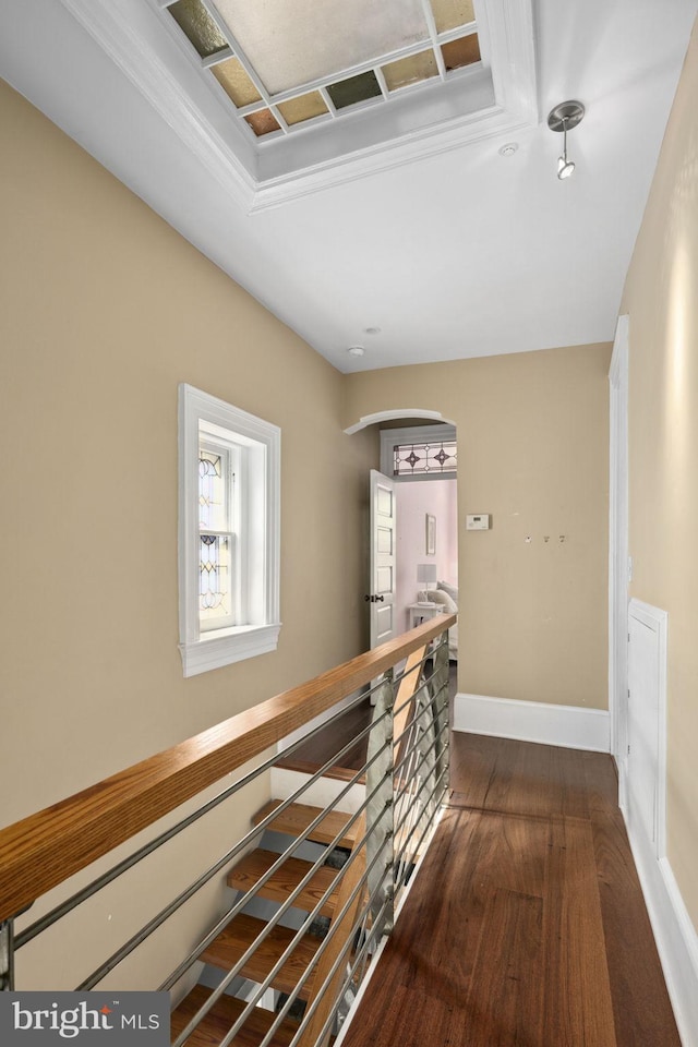 corridor featuring dark hardwood / wood-style flooring