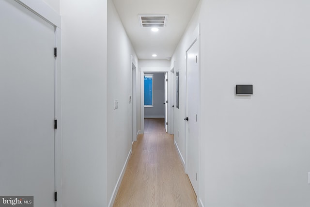 hallway featuring light wood-type flooring