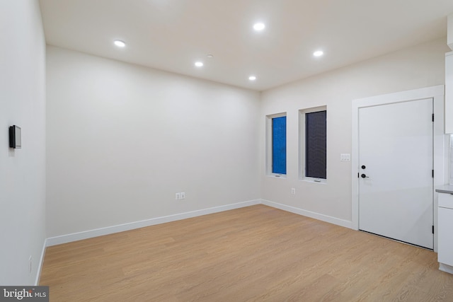 empty room featuring light hardwood / wood-style floors