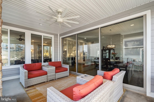 view of patio featuring ceiling fan