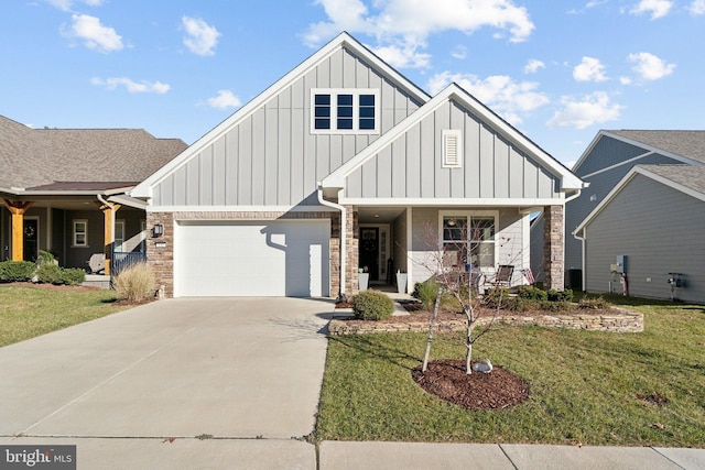 view of front of home featuring a porch, a garage, and a front yard